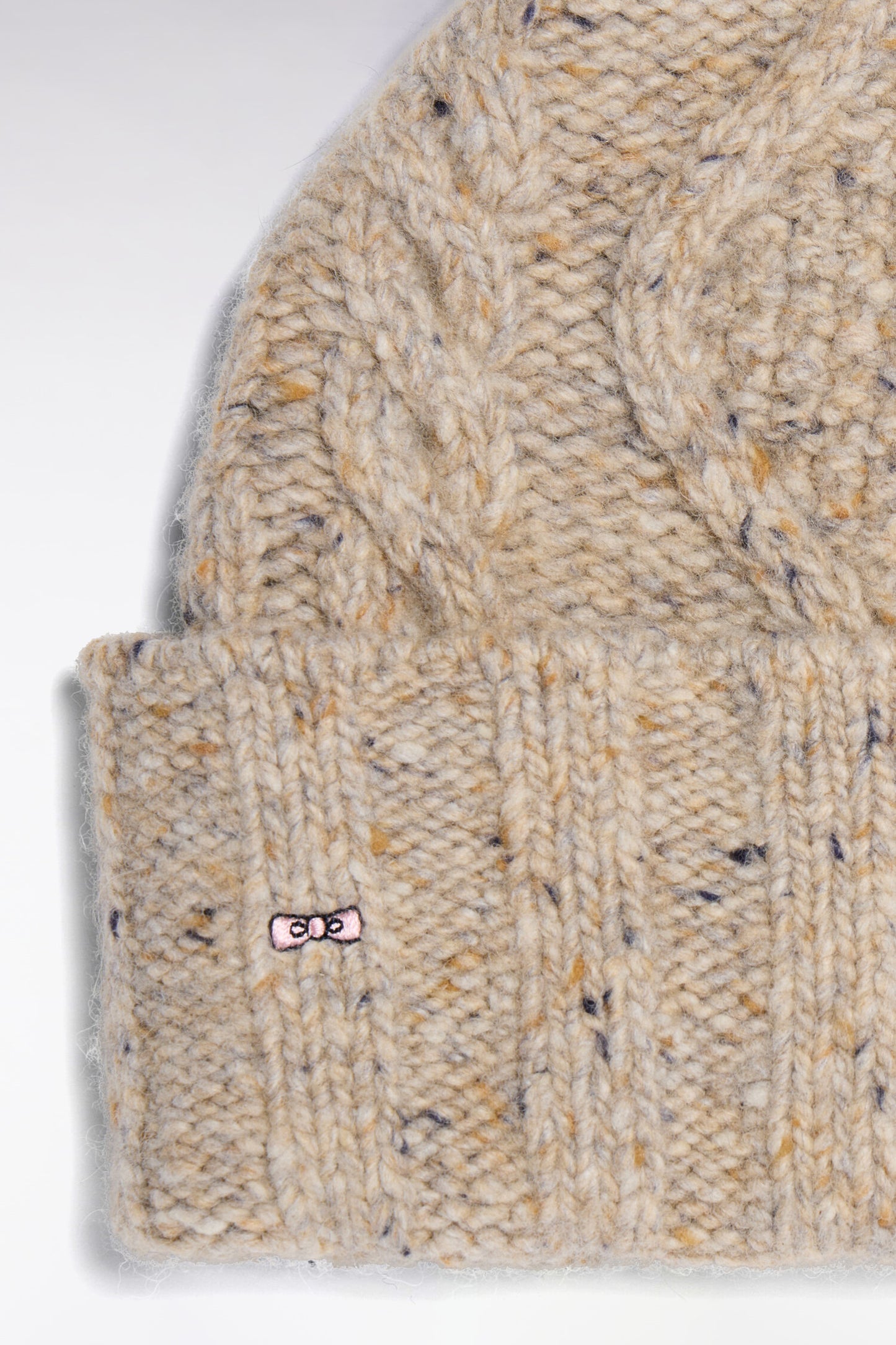 Bonnet en maille torsadée beige