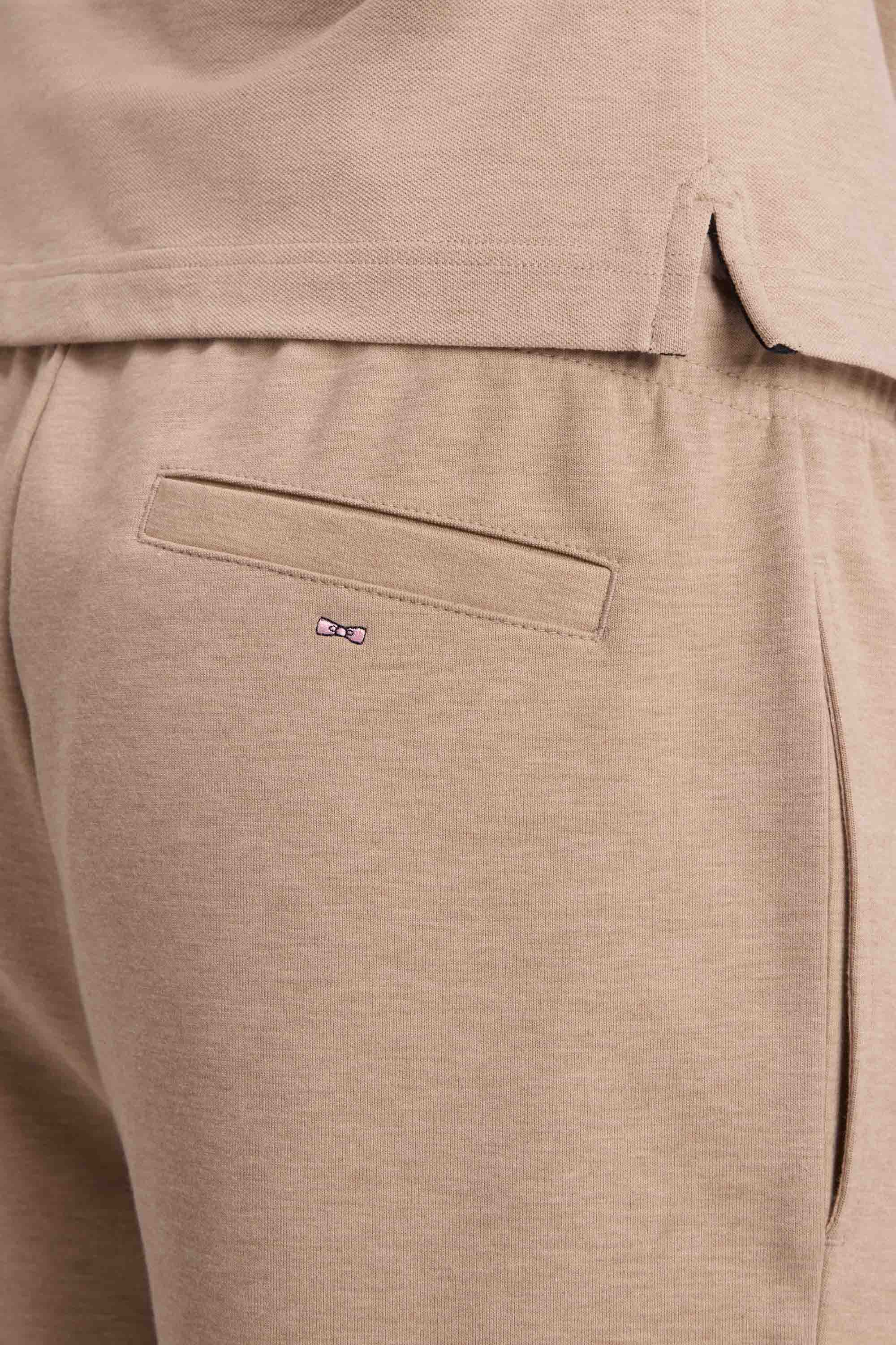 Jogging en interlock de coton stretch beige coupe droite