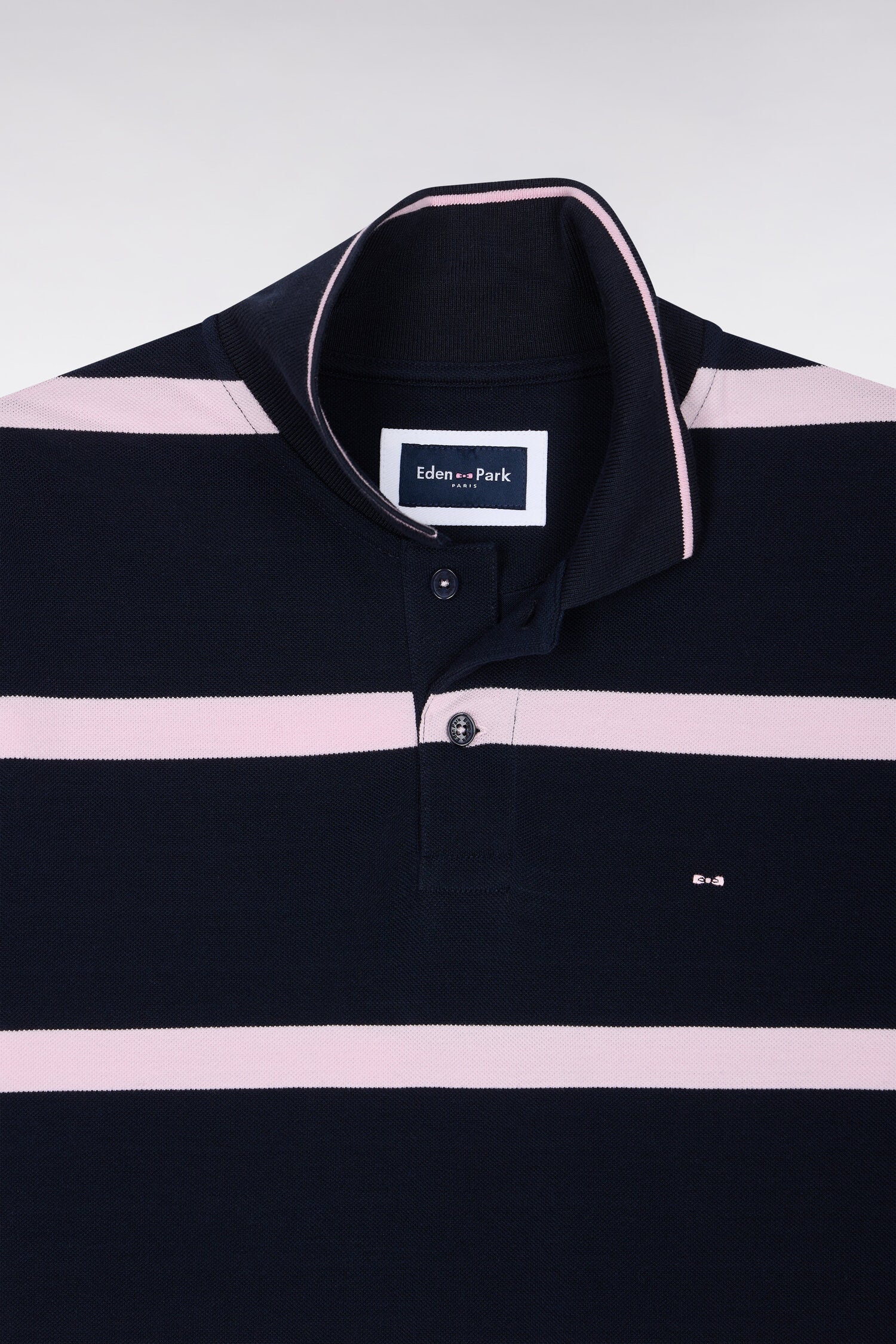 Polo manches courtes marine à rayures roses coupe droite