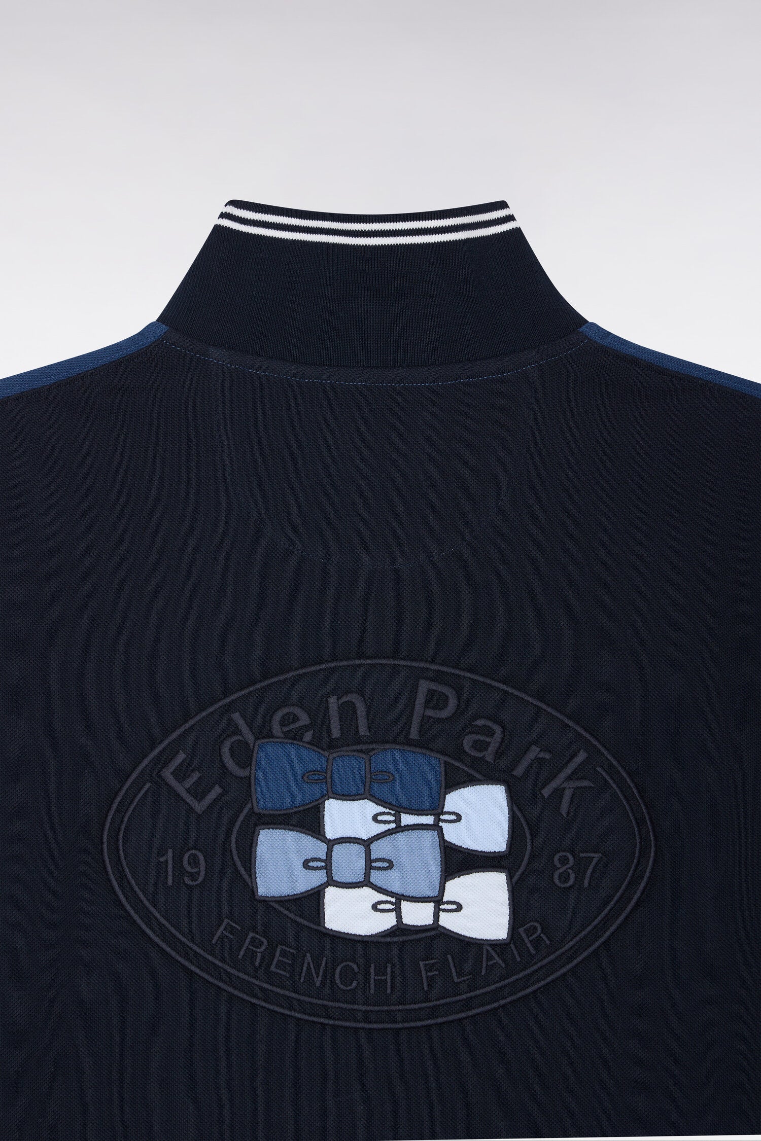 Polo manches courtes en coton tricolore bleu coupe droite