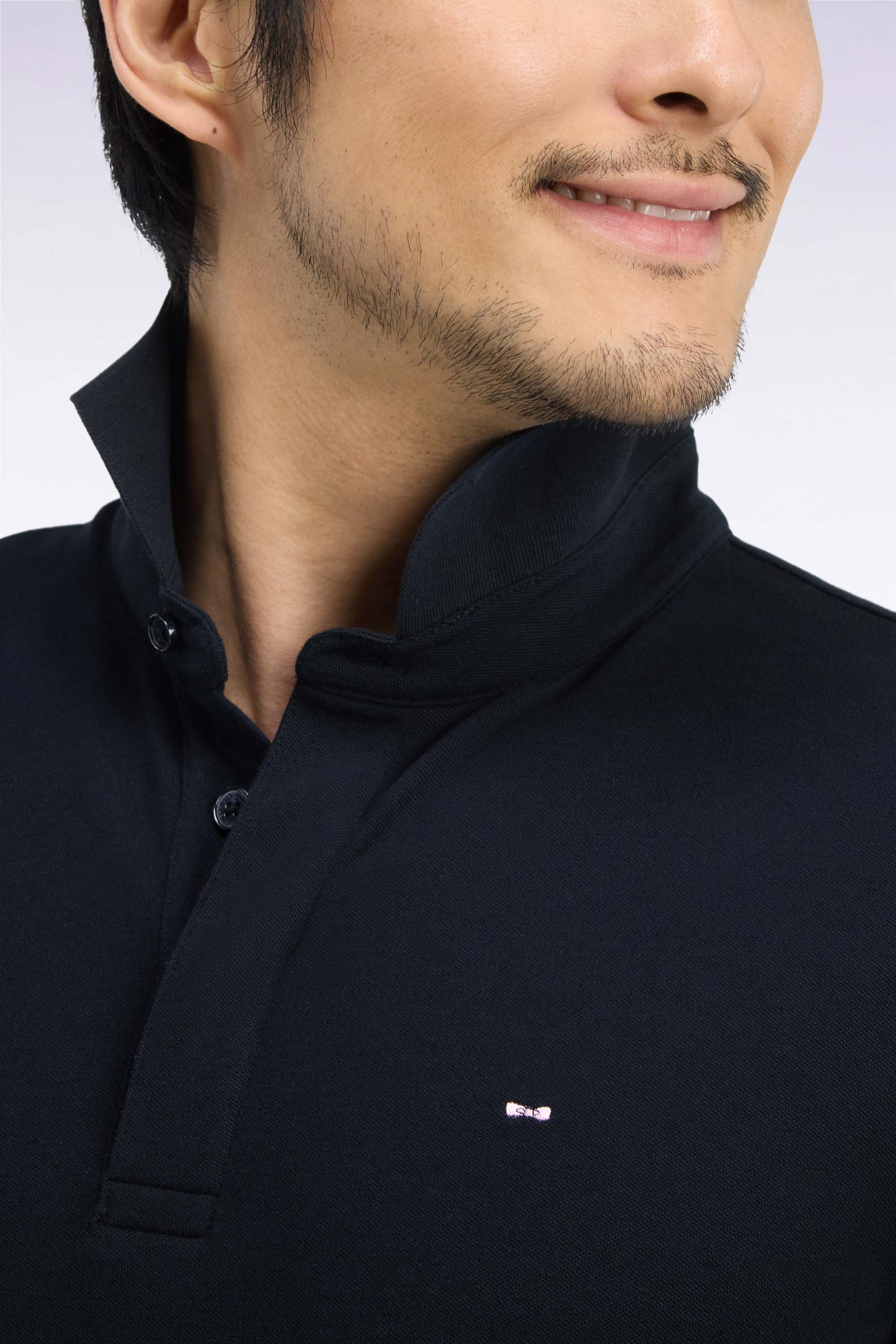 Polo manches longues en coton stretch noir coupe ajustée