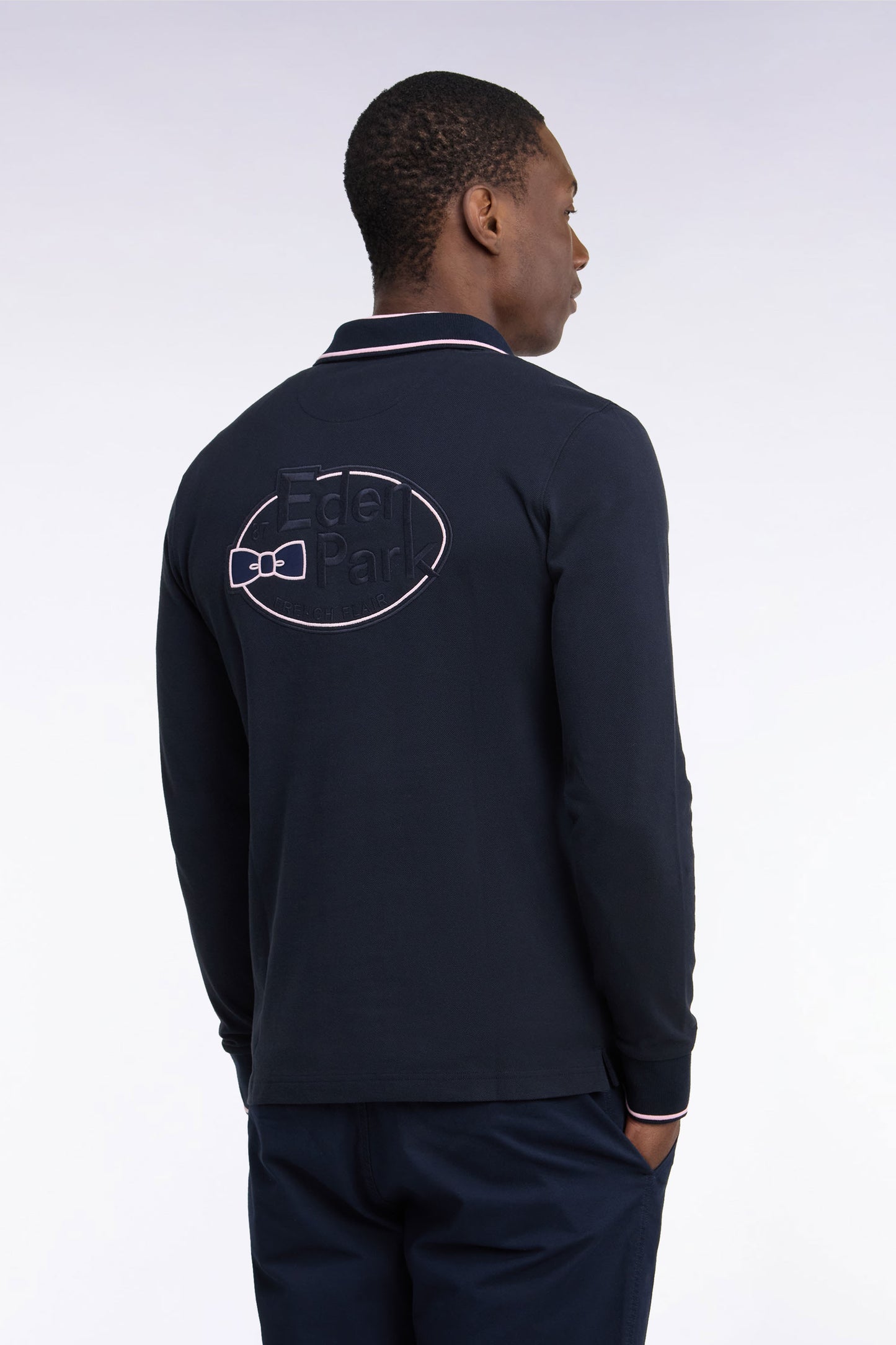 Polo à manches longues en piqué coton marine à liseré rose broderie dos