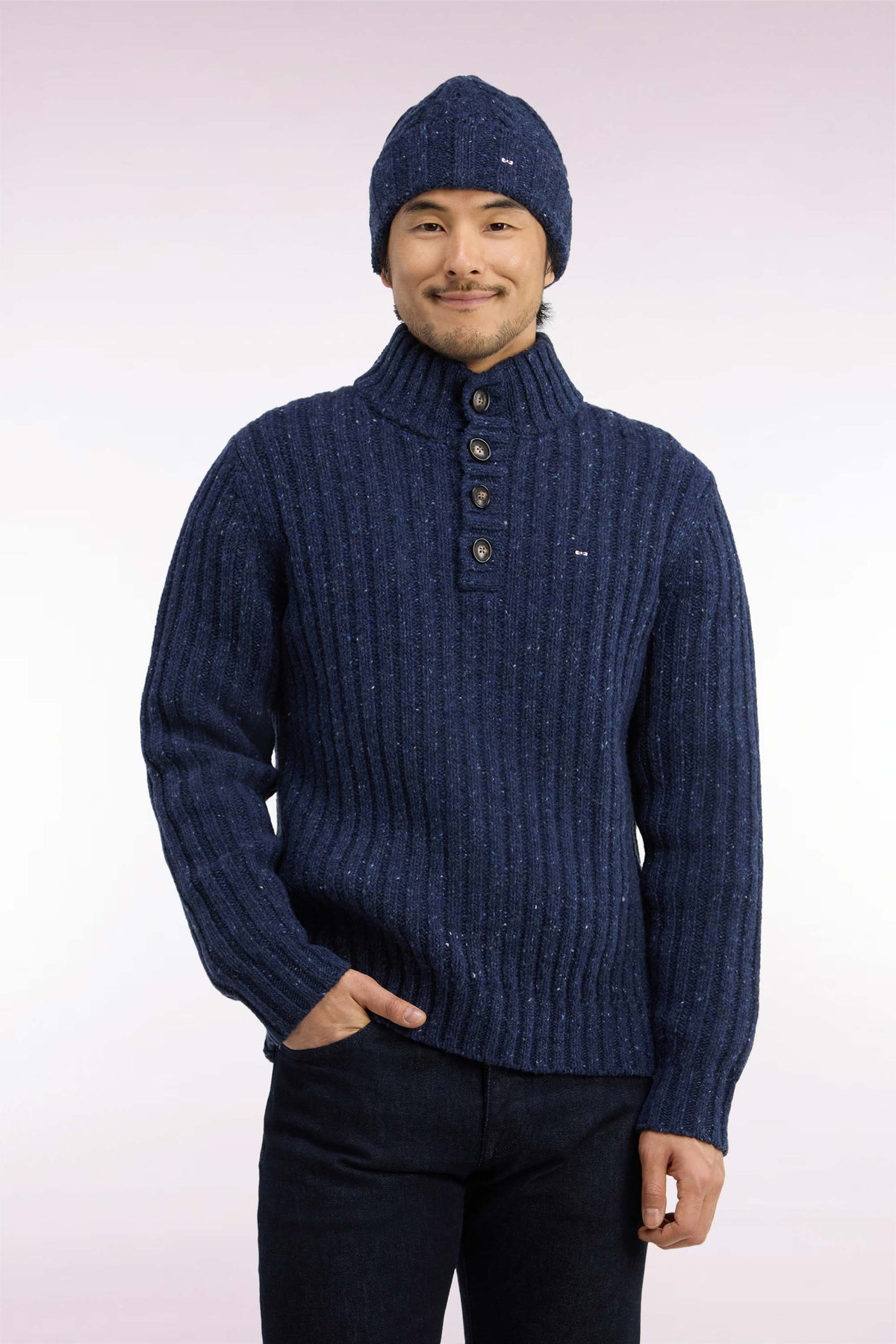 Buttoned high-neck sweater in heather blue ribbed chunky knit