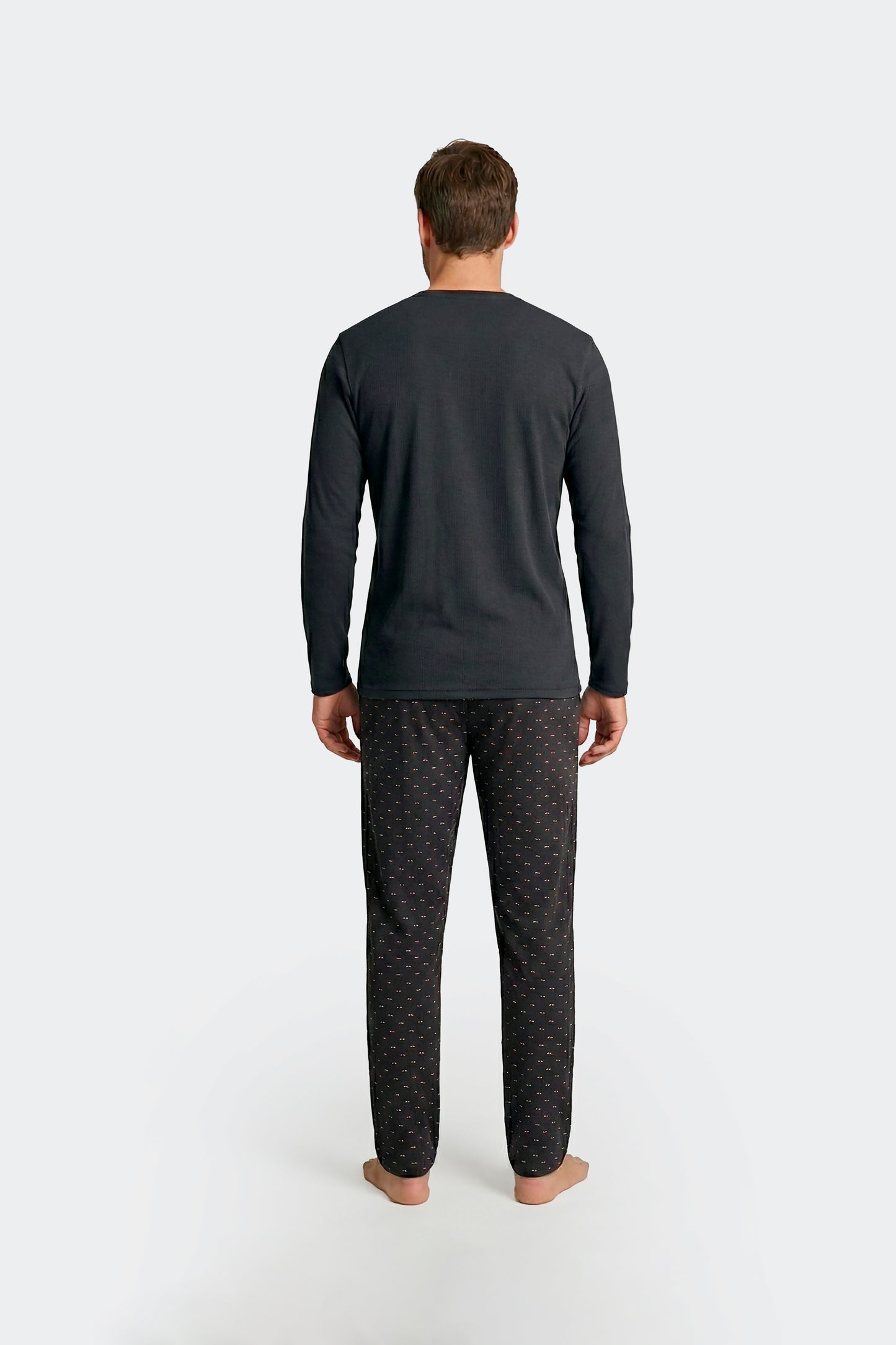 Ensemble pyjama long en coton T-shirt uni marine et pantalon imprimé nœuds papillon