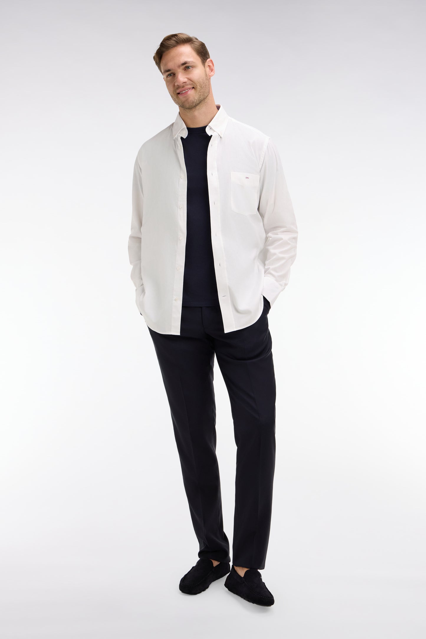 Slim dark blue wool trousers with broken fold