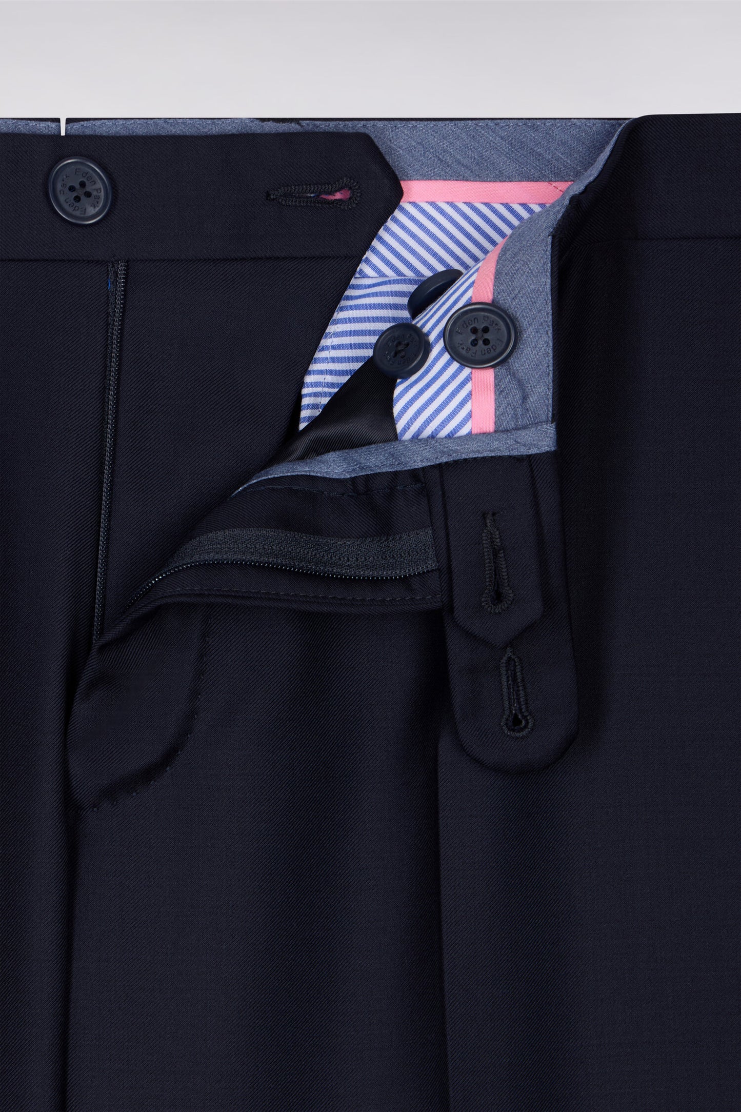 Slim dark blue wool trousers with broken fold