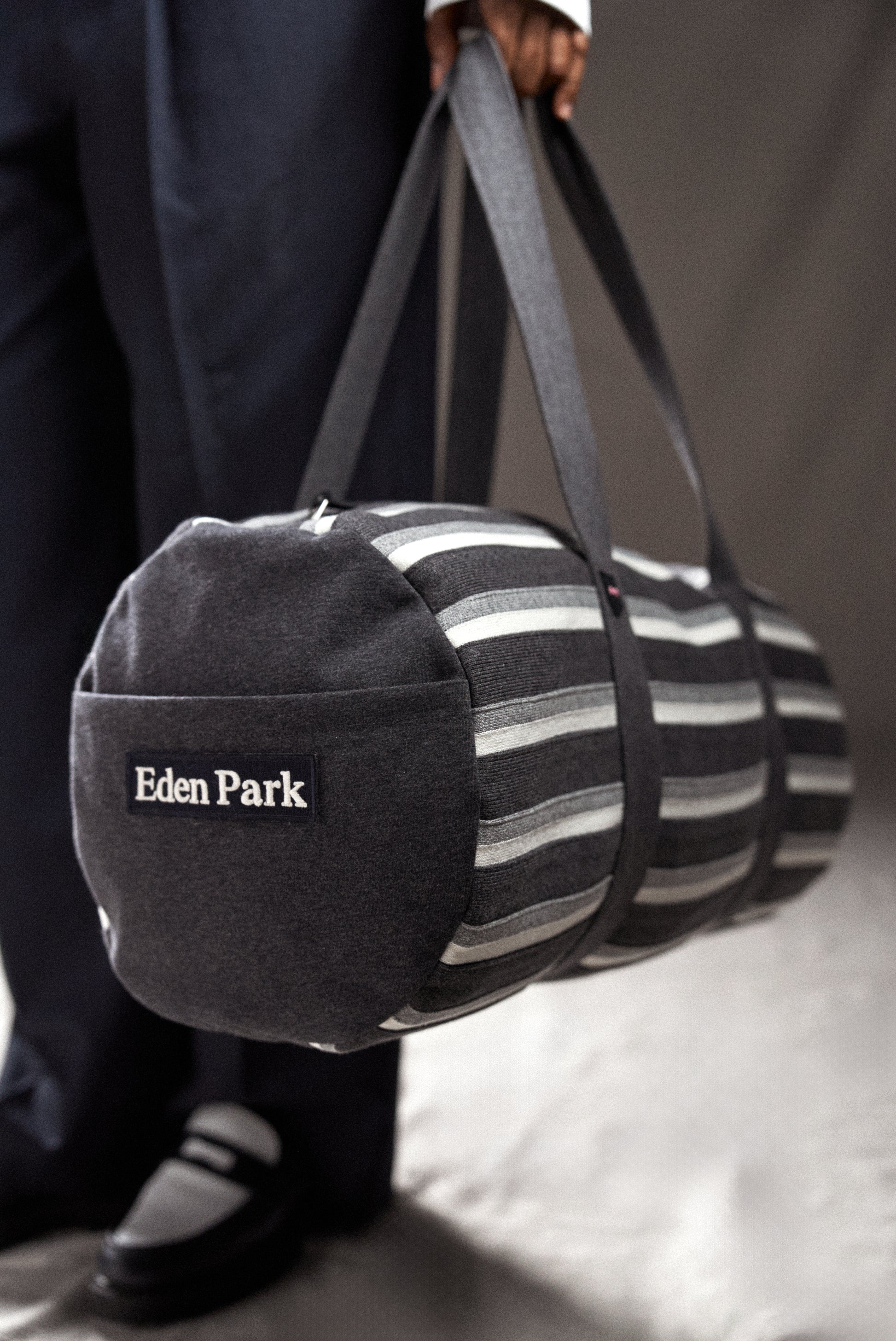 Black and white striped duffle bag deals