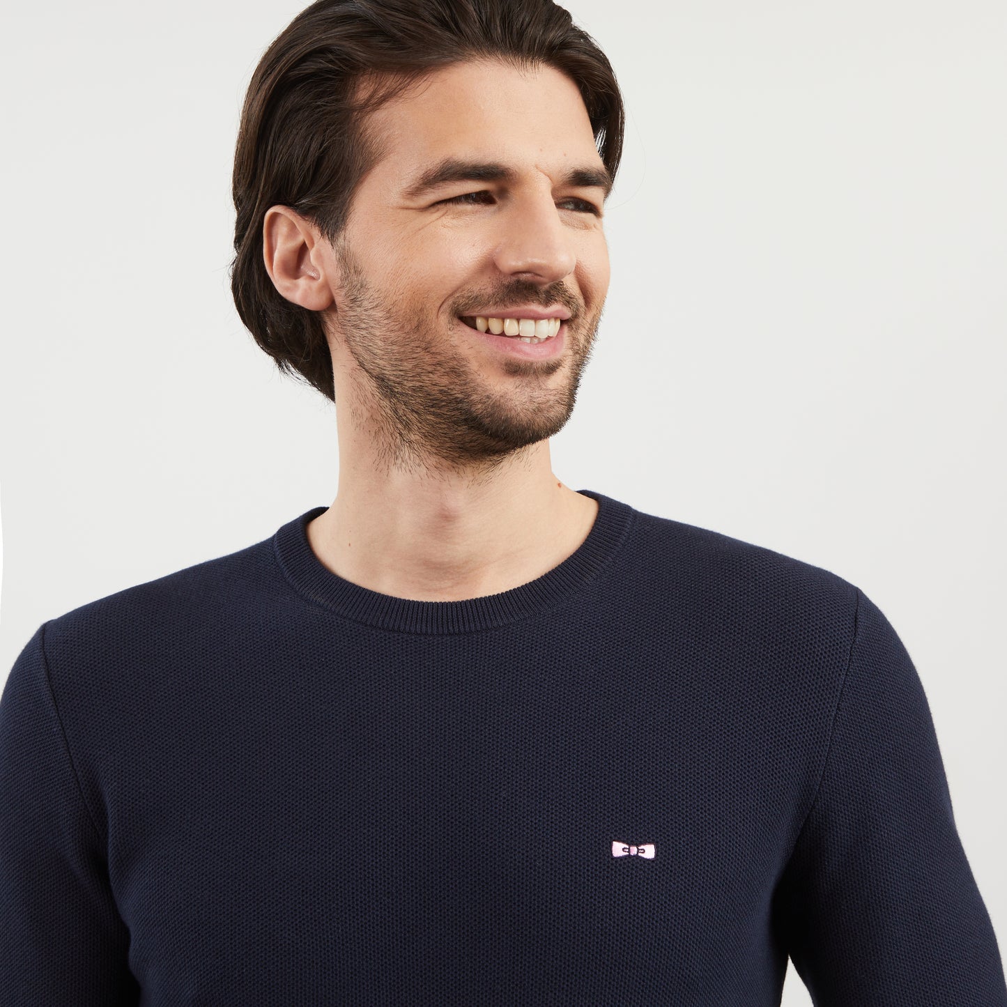 Dark blue jumper in decorative cable knit