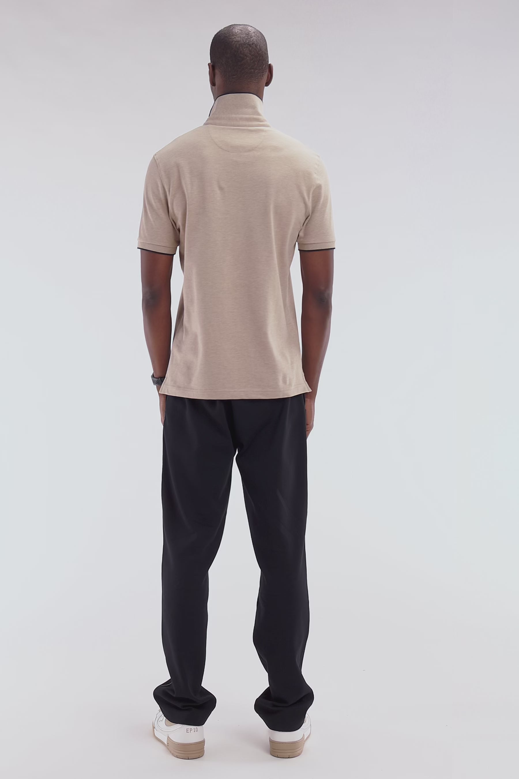 Polo à manches courtes en piqué de coton chiné stretch beige coupe ajustée