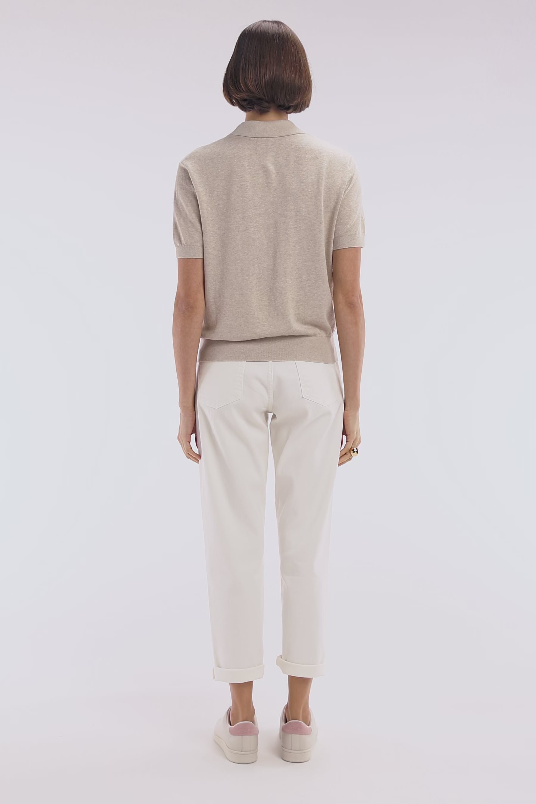 Pull manches courtes à col polo beige coupe droite