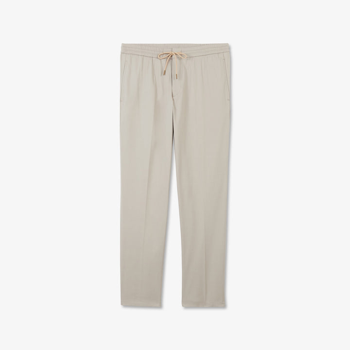 Pantalon beige à plis cassés