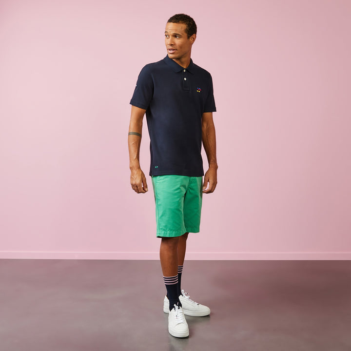 Polo bleu foncé à broderie nœuds tricolores
