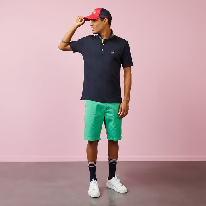 Polo bleu marine col rayé multicolore