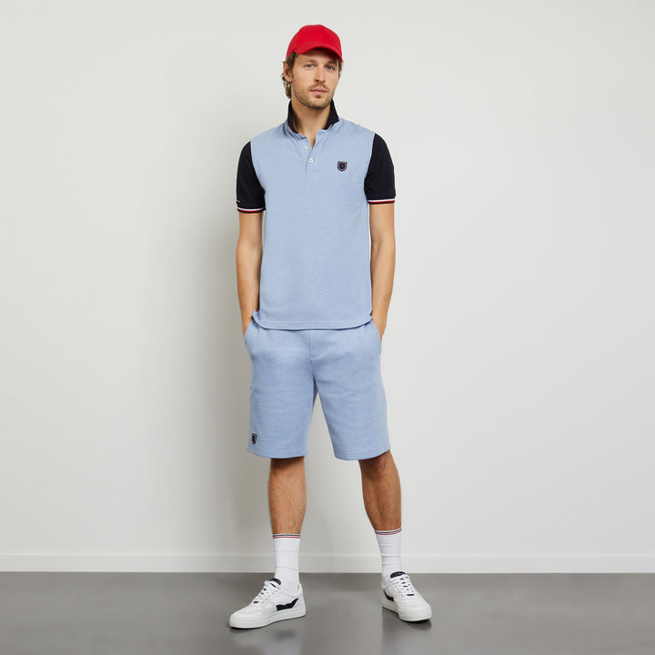 Polo color-block bleu à logo écusson