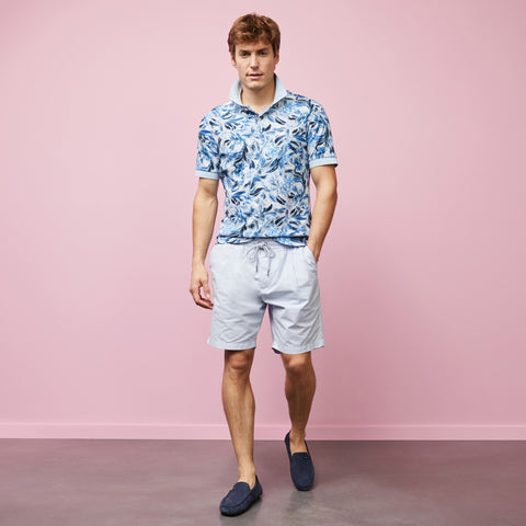 Light blue polo in cotton pique with floral print - Image 1