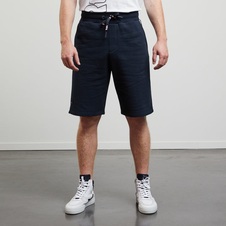 Short bleu foncé à inscriptions rugby